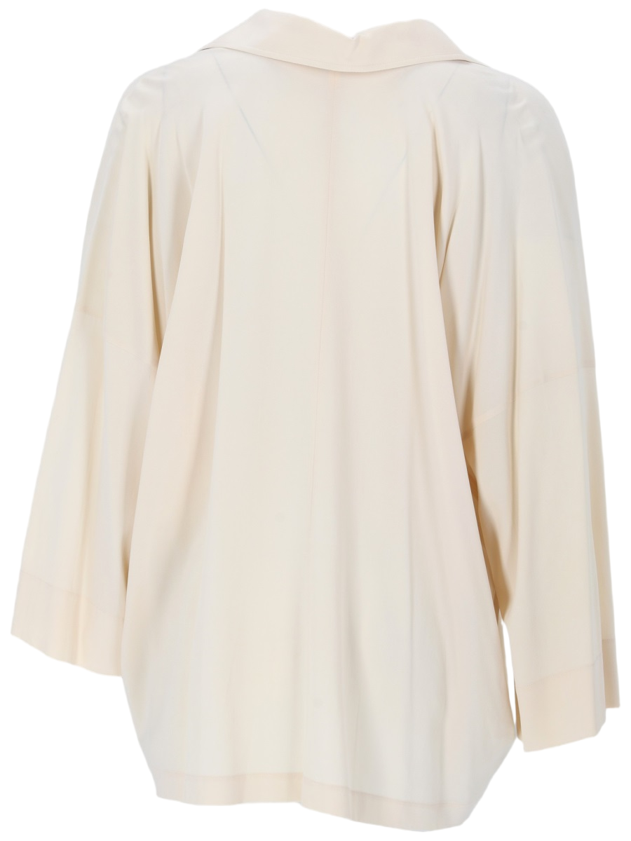 Loose-Fitting Blouse with V-Neckline and Asymmetrical Hem