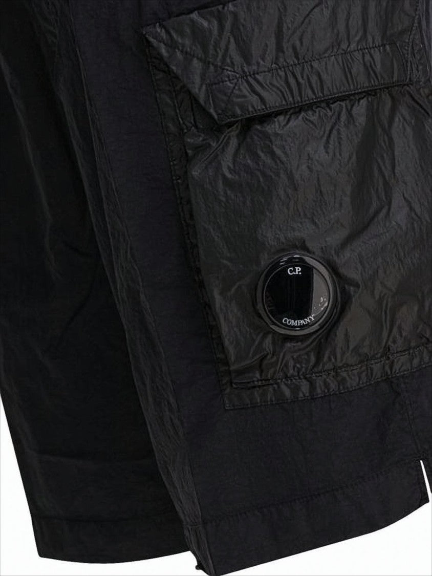 Black Minimalist Beach Shorts with Unique Lens Detail