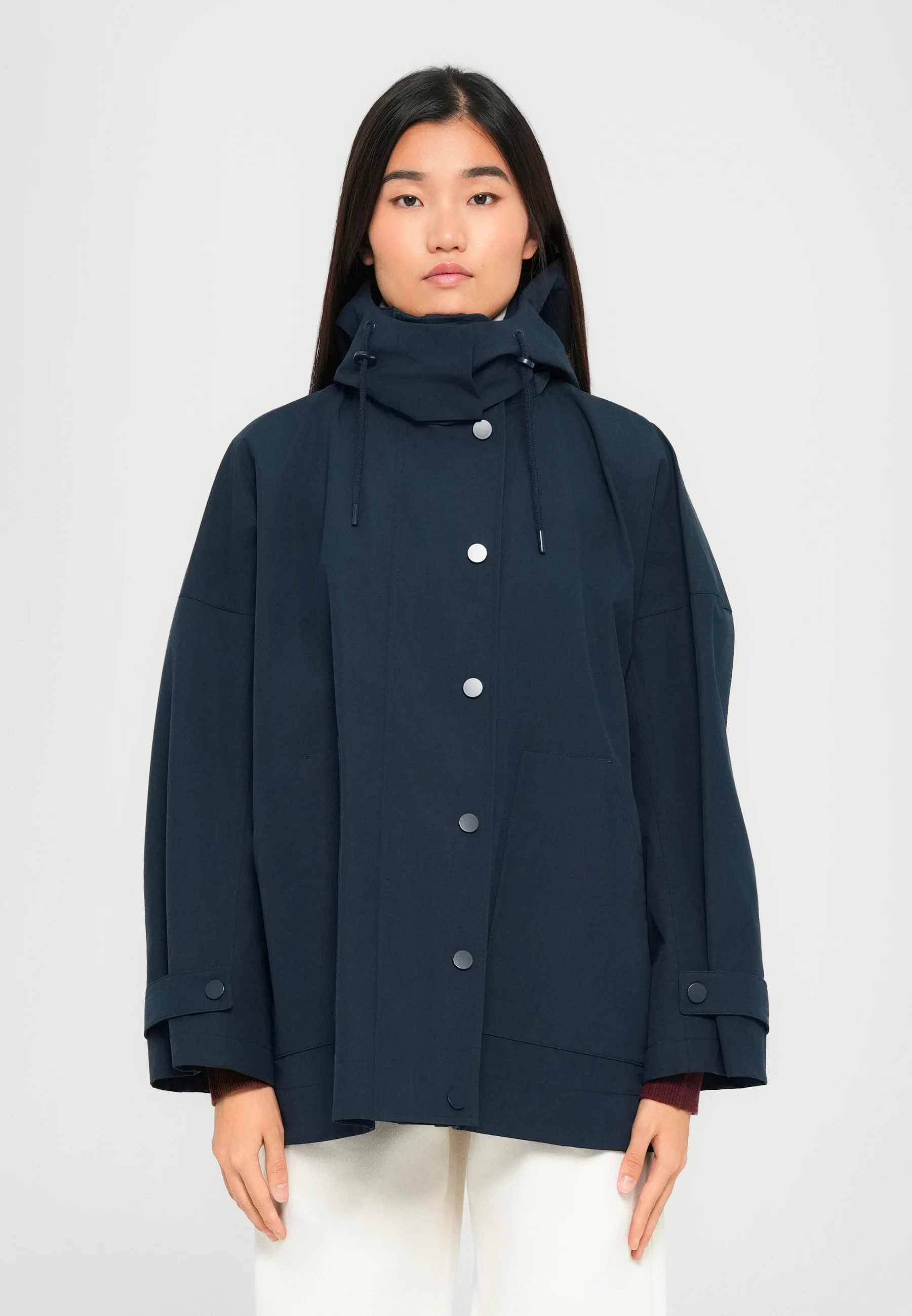 Versatile Blue Raincoat With Drawstring Hood