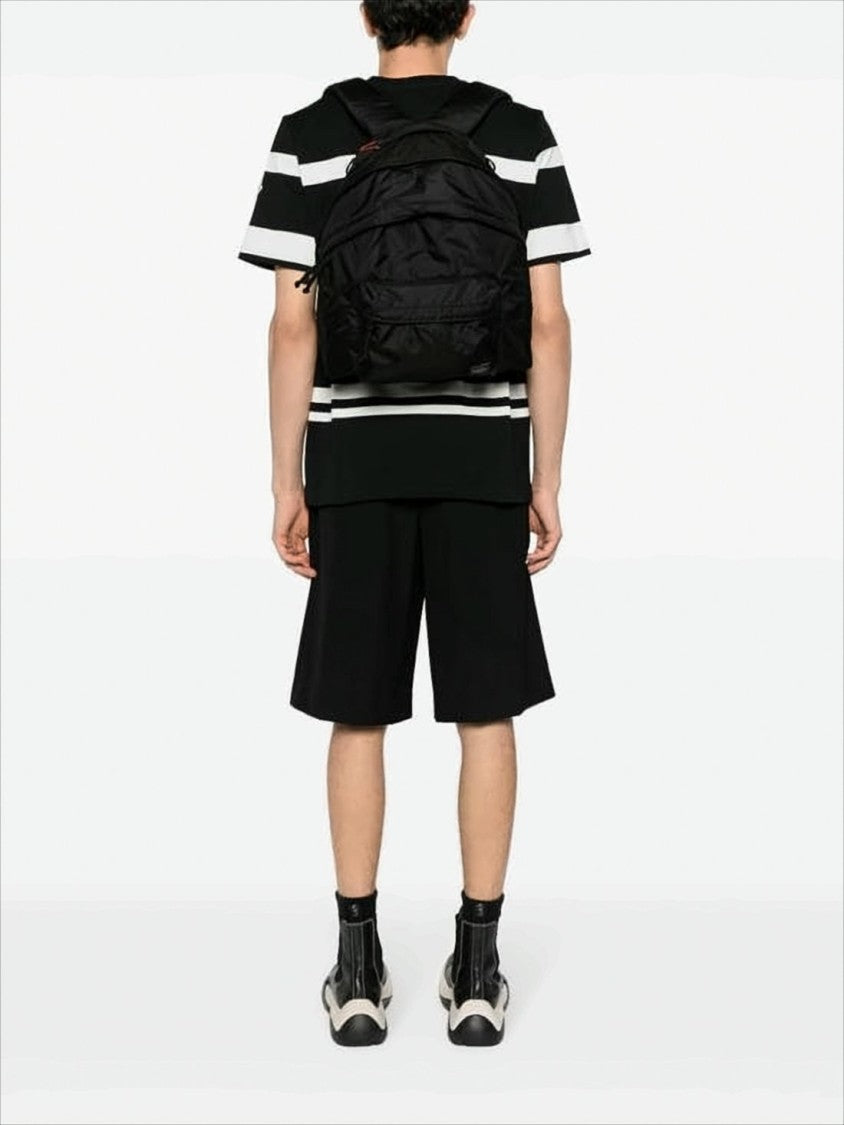 Black Nylon Backpack With Spacious Compartment And Versatile Carrying Options