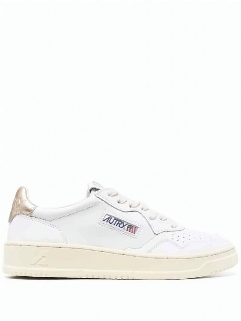 Smooth White Leather Low-Top Sneakers with Metallic Accents