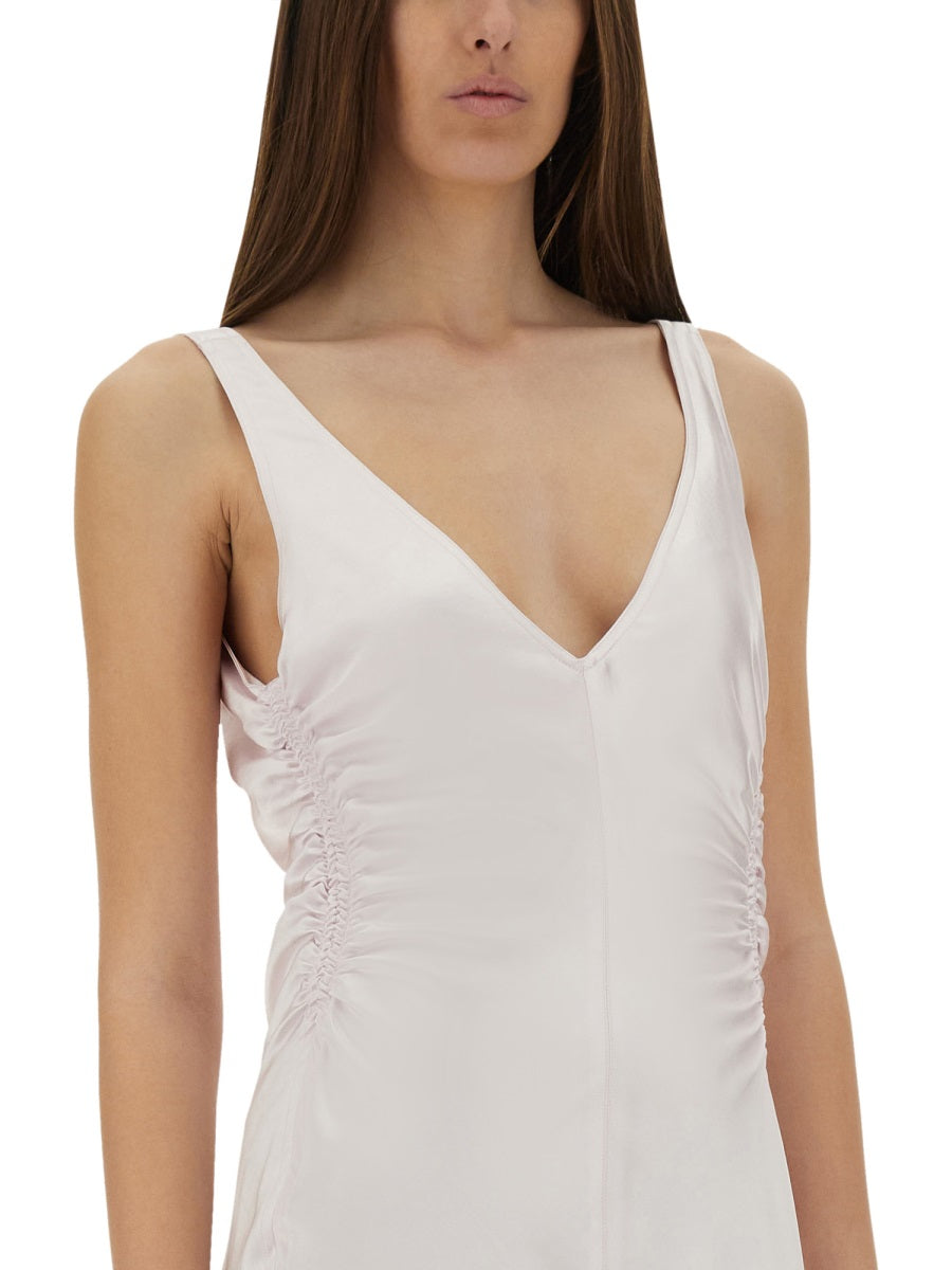 Long Dress With Deep V-Neckline And Flared Hem