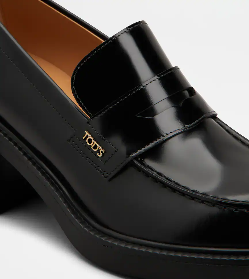 Refined Black Calfskin Loafers With Timeless Design