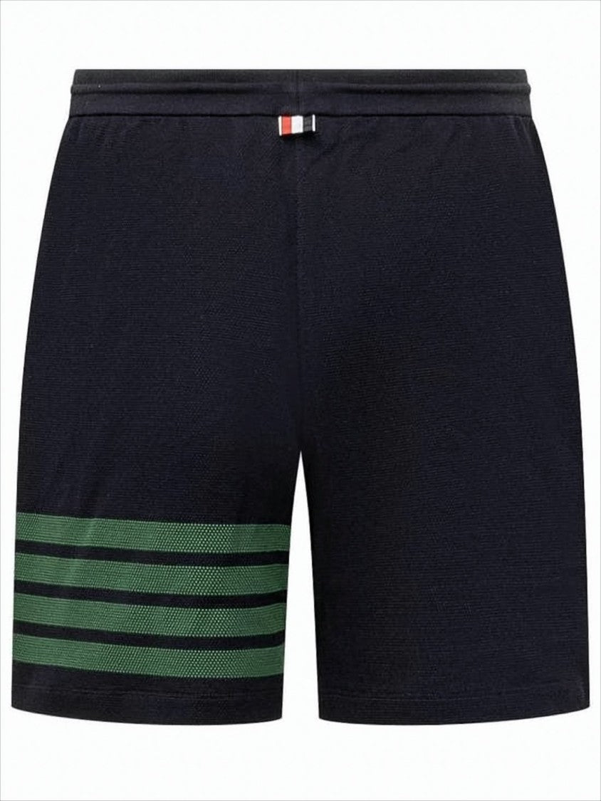 Tailored Black Shorts with Distinctive Green Stripe Detail