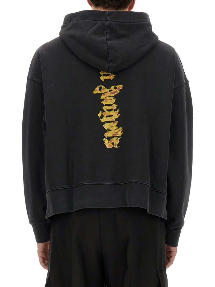 Relaxed Fit Black Hoodie With Vibrant Graphic Design