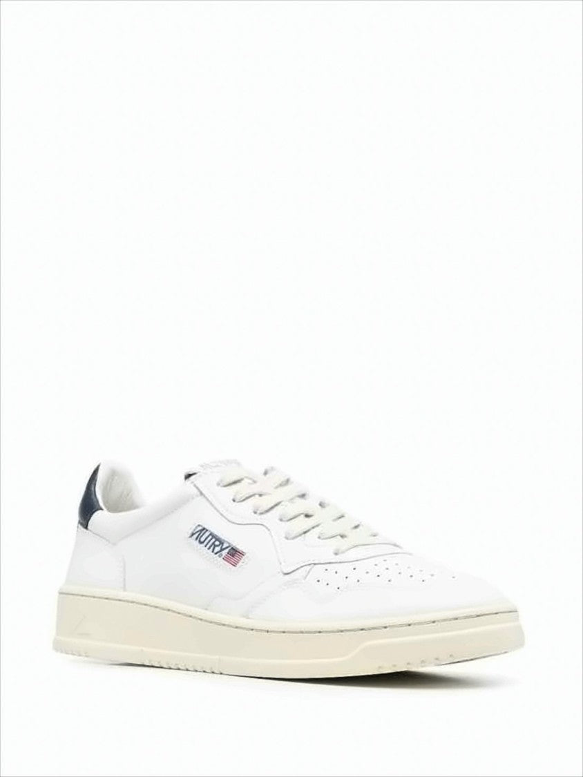 Minimalist Low-Top Sneakers with Perforated Detailing