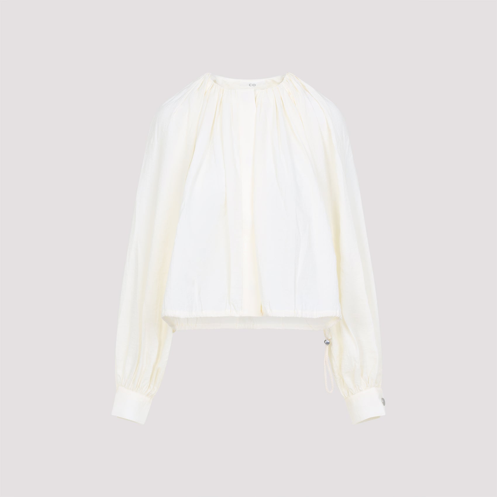 Long-Sleeved White Top with Adjustable Hem