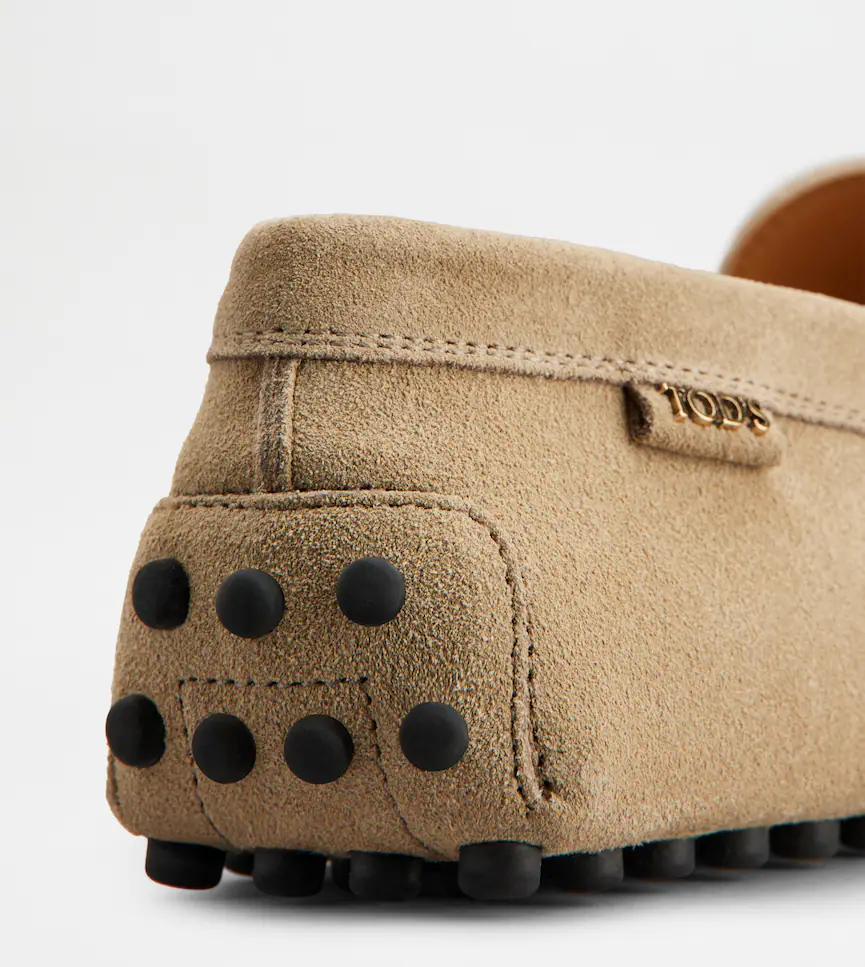 Classic Brown Leather Moccasins With Distinctive Detailing