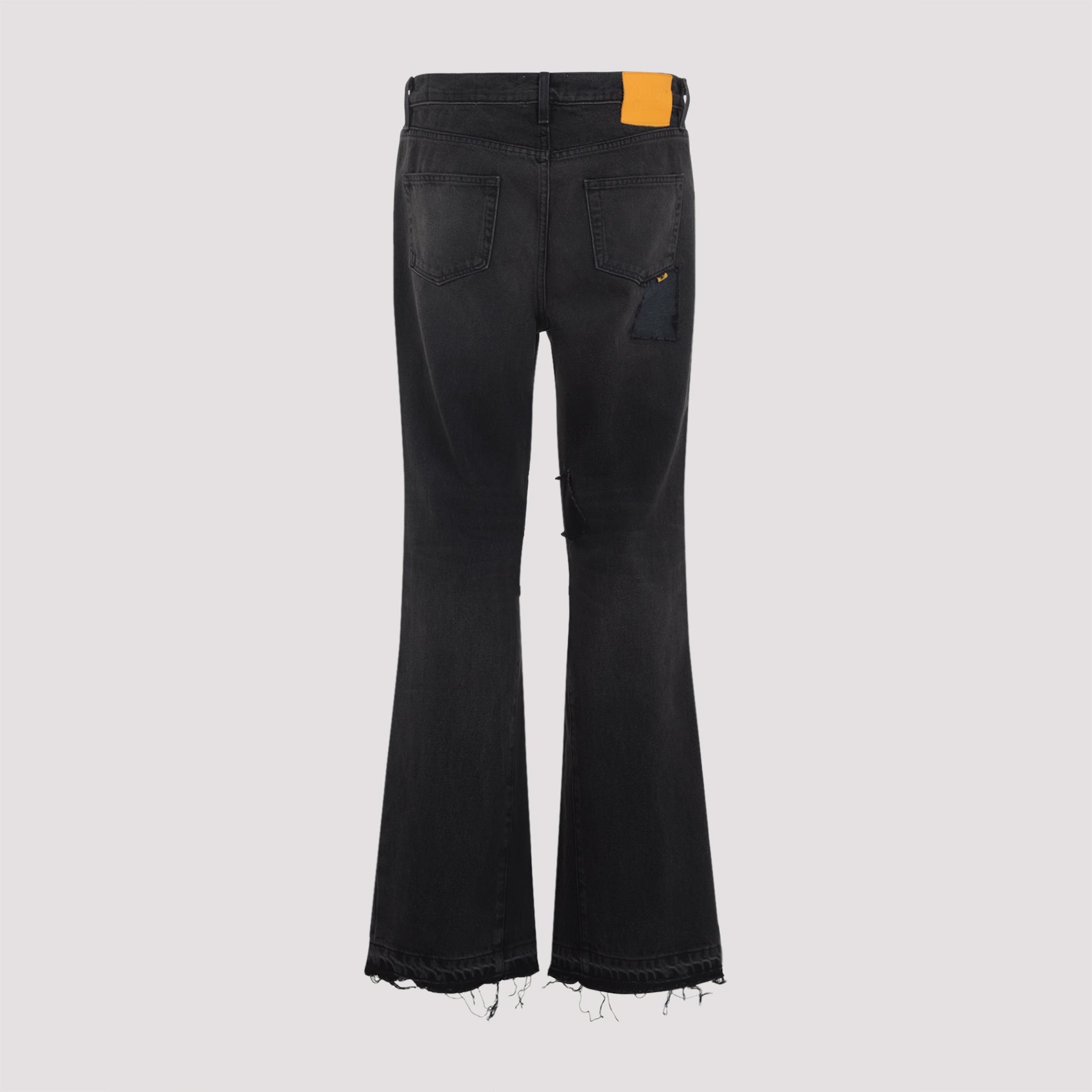 Distressed Black Jeans With Flared Leg