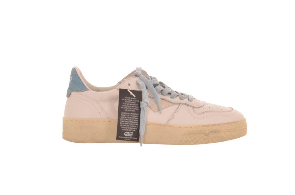 Retro White Leather Sneaker With Distressed Sole