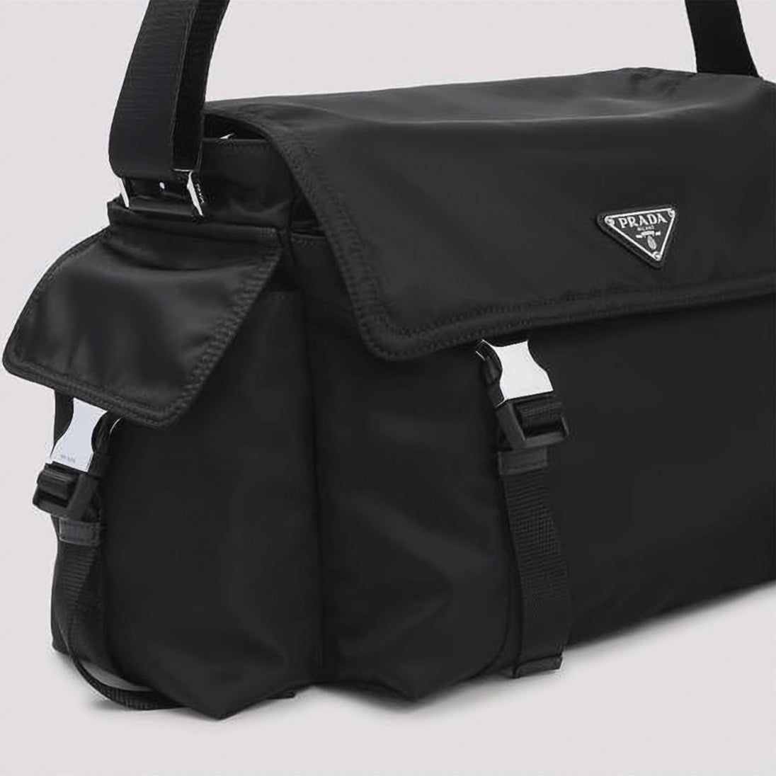 Crossbody Bag with Triangular Logo Plaque and Buckle Straps