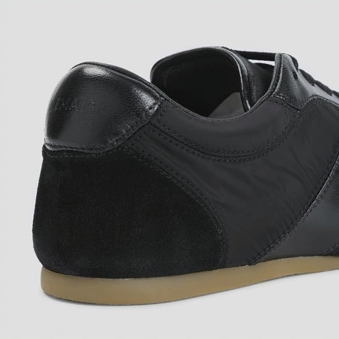 Low-Profile Black Sneakers with Smooth