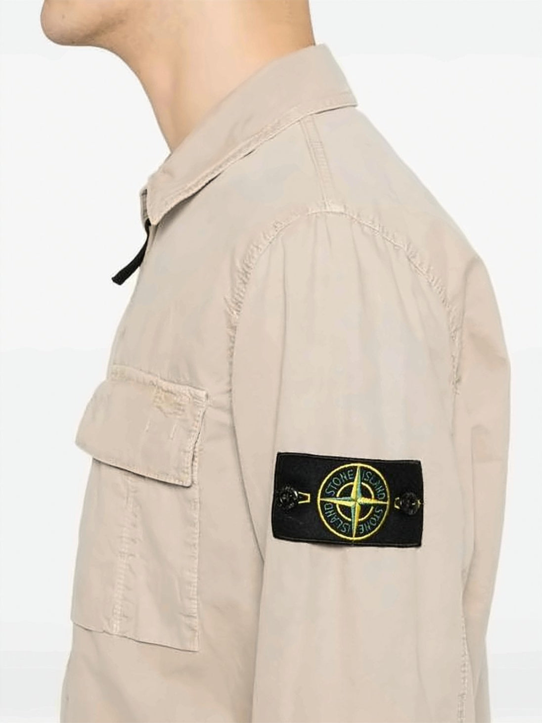 Beige Jacket with Distinctive Patch