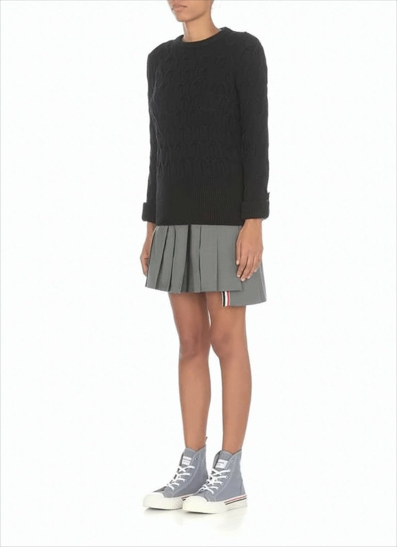 Structured Pleated Wool Mini Skirt with Distinctive Accents