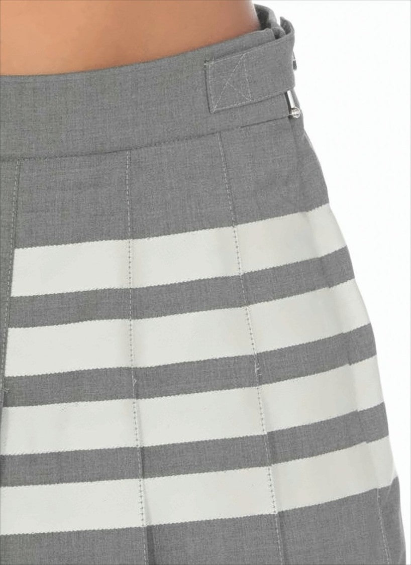Structured Pleated Wool Mini Skirt with Distinctive Accents