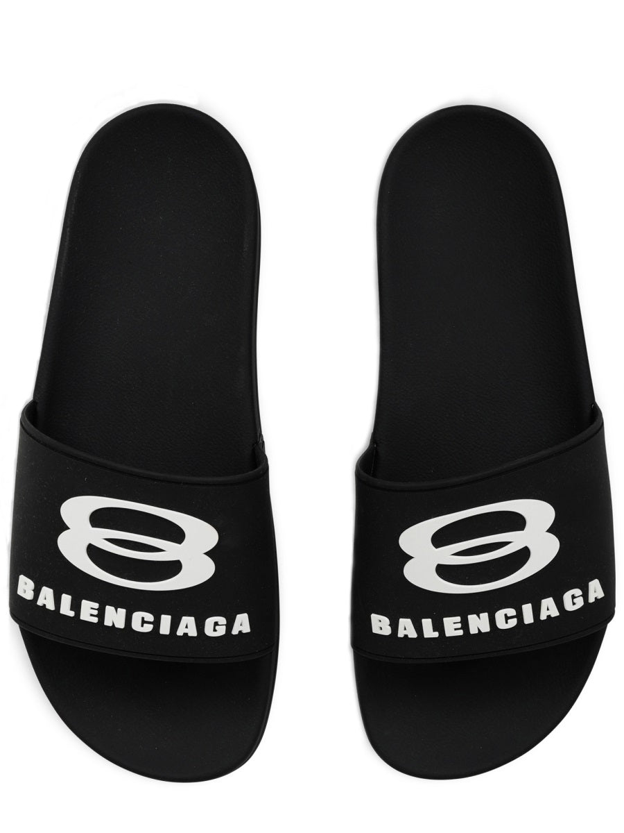 Contoured Black Slip-On Sandal With Bold Logo Print