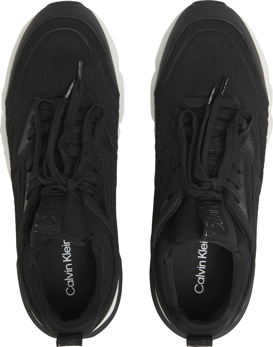 Black Sneakers With Textured Upper And Rubber Sole
