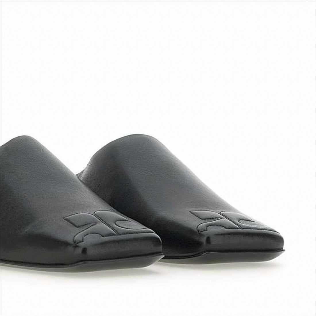 Minimalist Black Lambskin Slip-On Mules with Embossed Detail