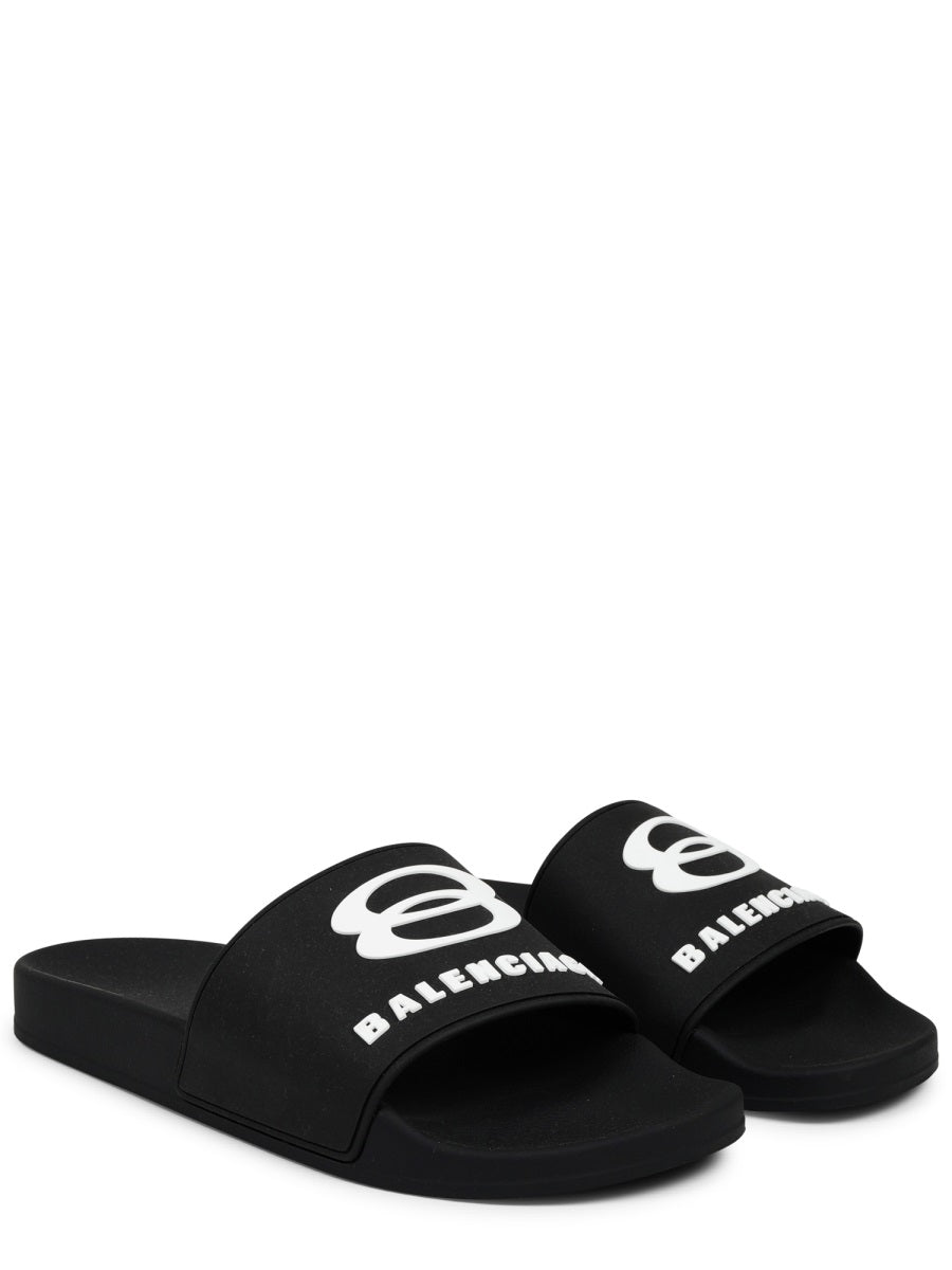Contoured Black Slip-On Sandal With Bold Logo Print