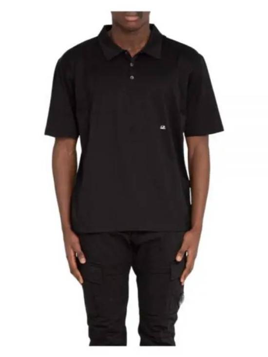 Classic Black Polo Shirt With Collared Neckline And Subtle Logo Detail