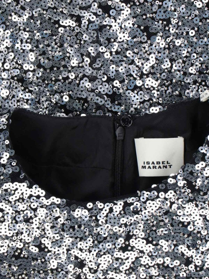 Sleek Silver Top With Minimalist Design And Modern Silhouette