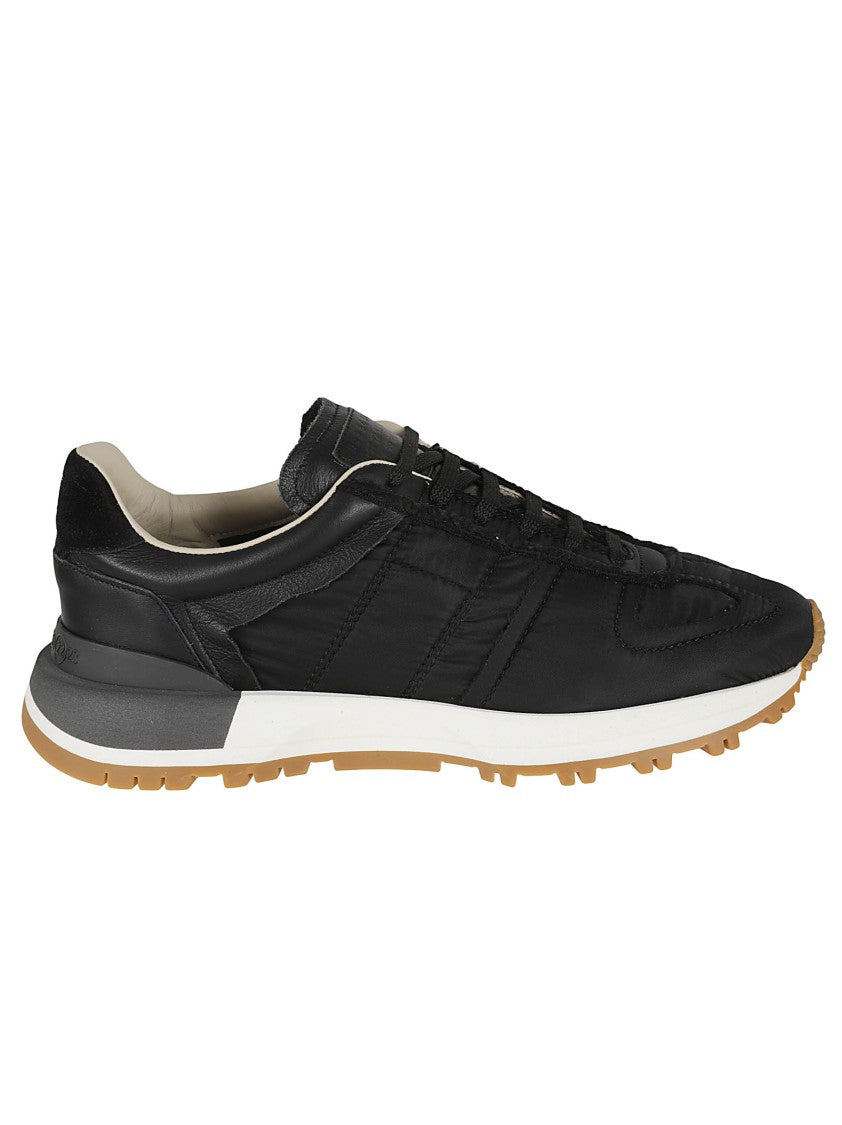 Sporty Black Sneakers With Textured Detailing