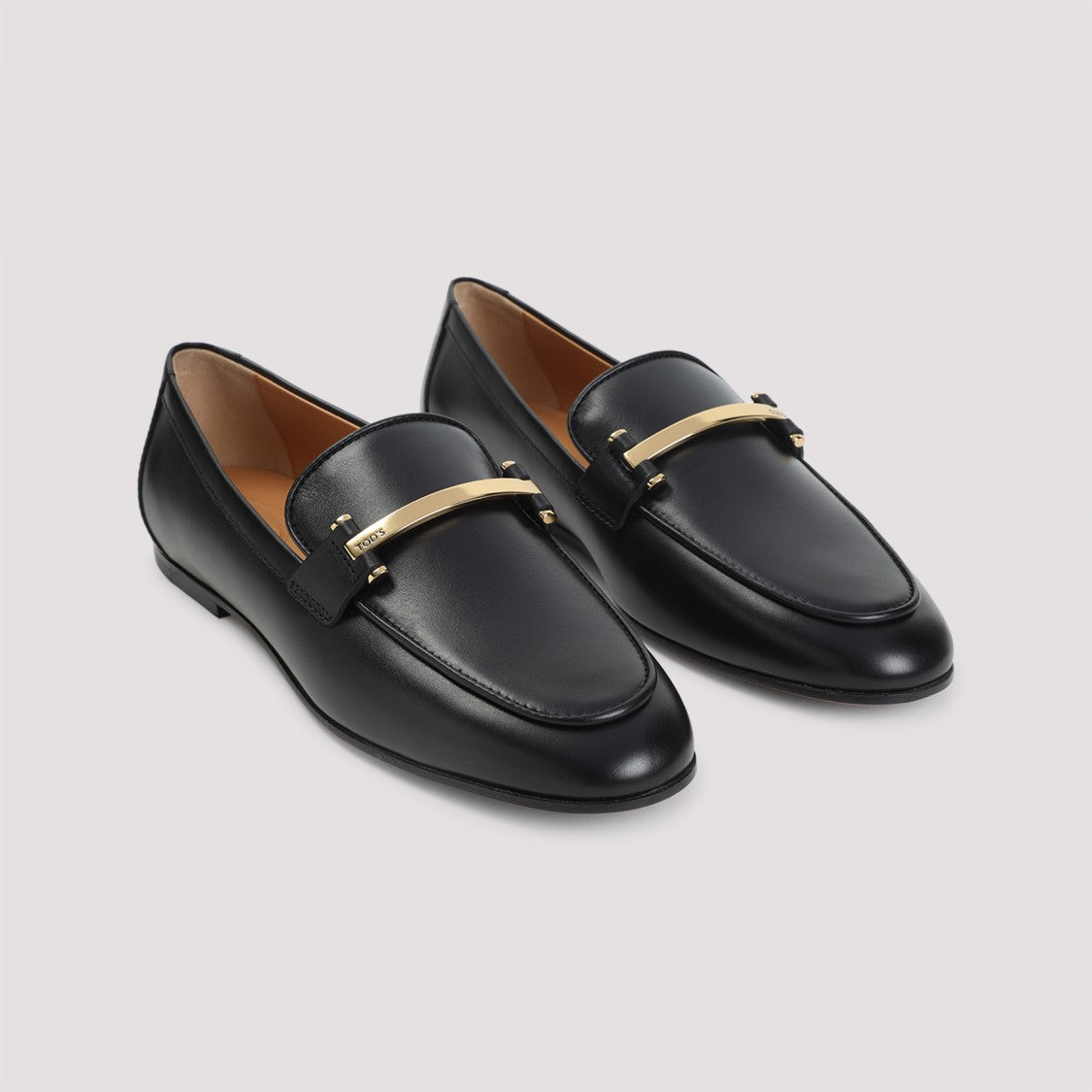 Black Leather Loafers With Subtle Gold Accents