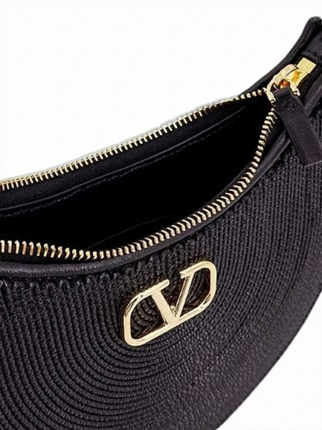 Crescent-Shaped Textured Lambskin Shoulder Bag with Metallic Emblem