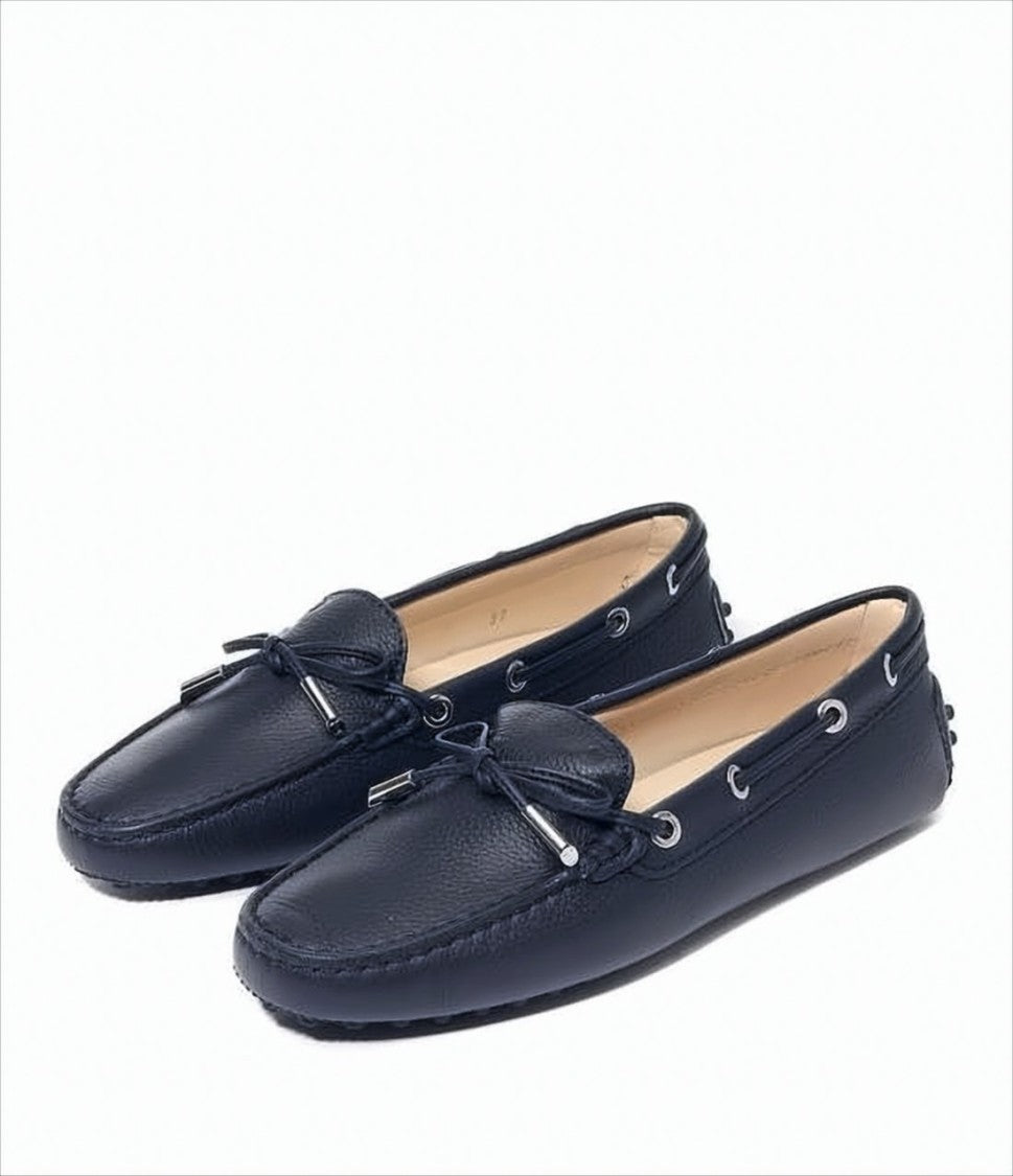 Pebbled Leather Loafers with Decorative Bow and Studded Sole