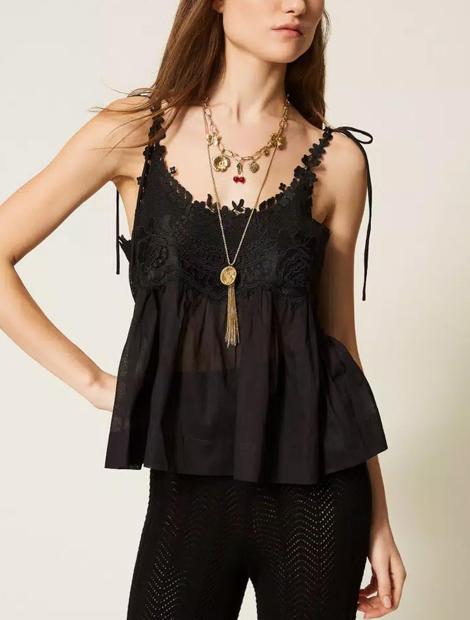 Sleeveless Black Top with Delicate Crochet Detailing