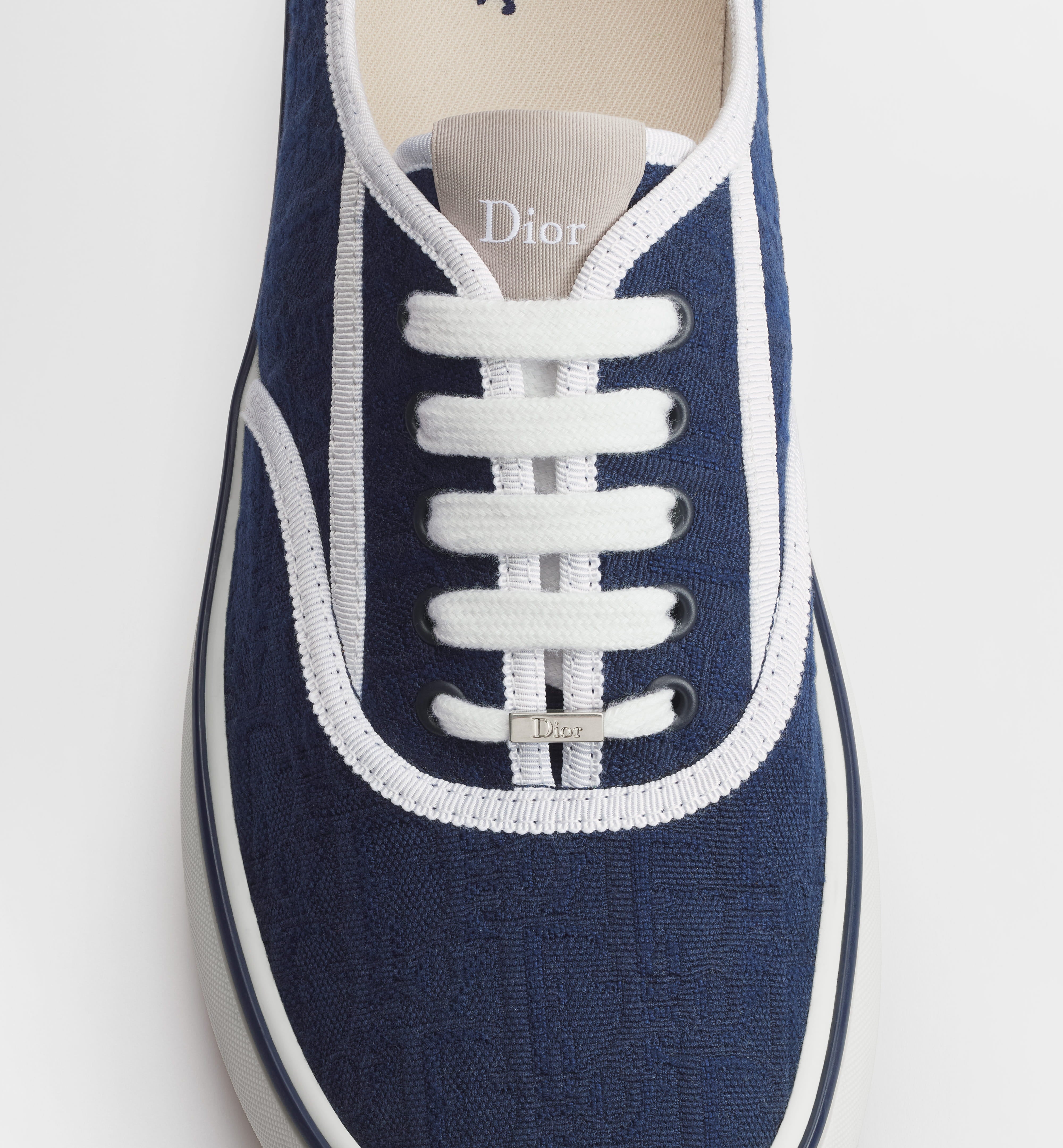 Low-Top Navy Sneaker With Textured Upper And White Accents