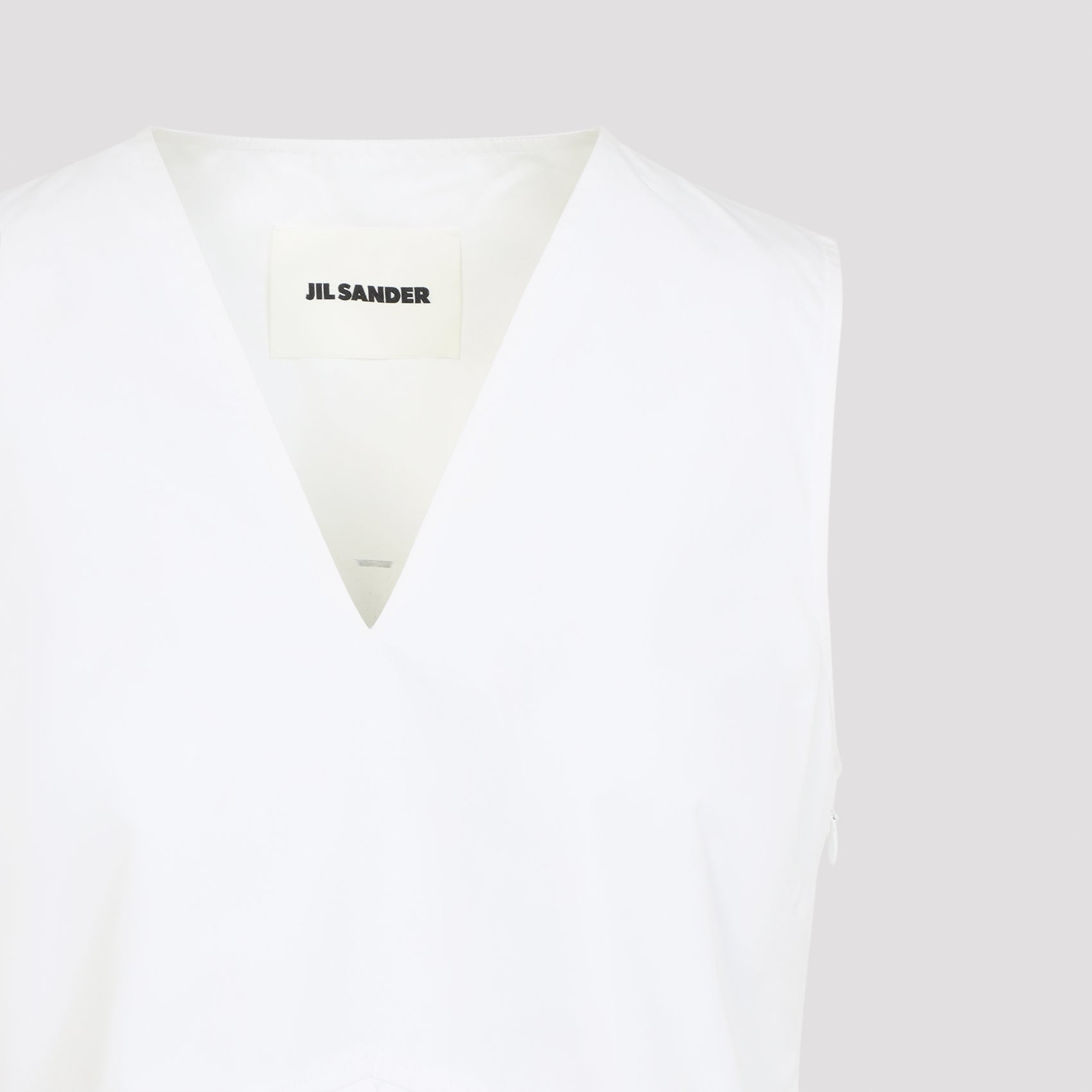 Structured Sleeveless Top With Deep V-Neckline