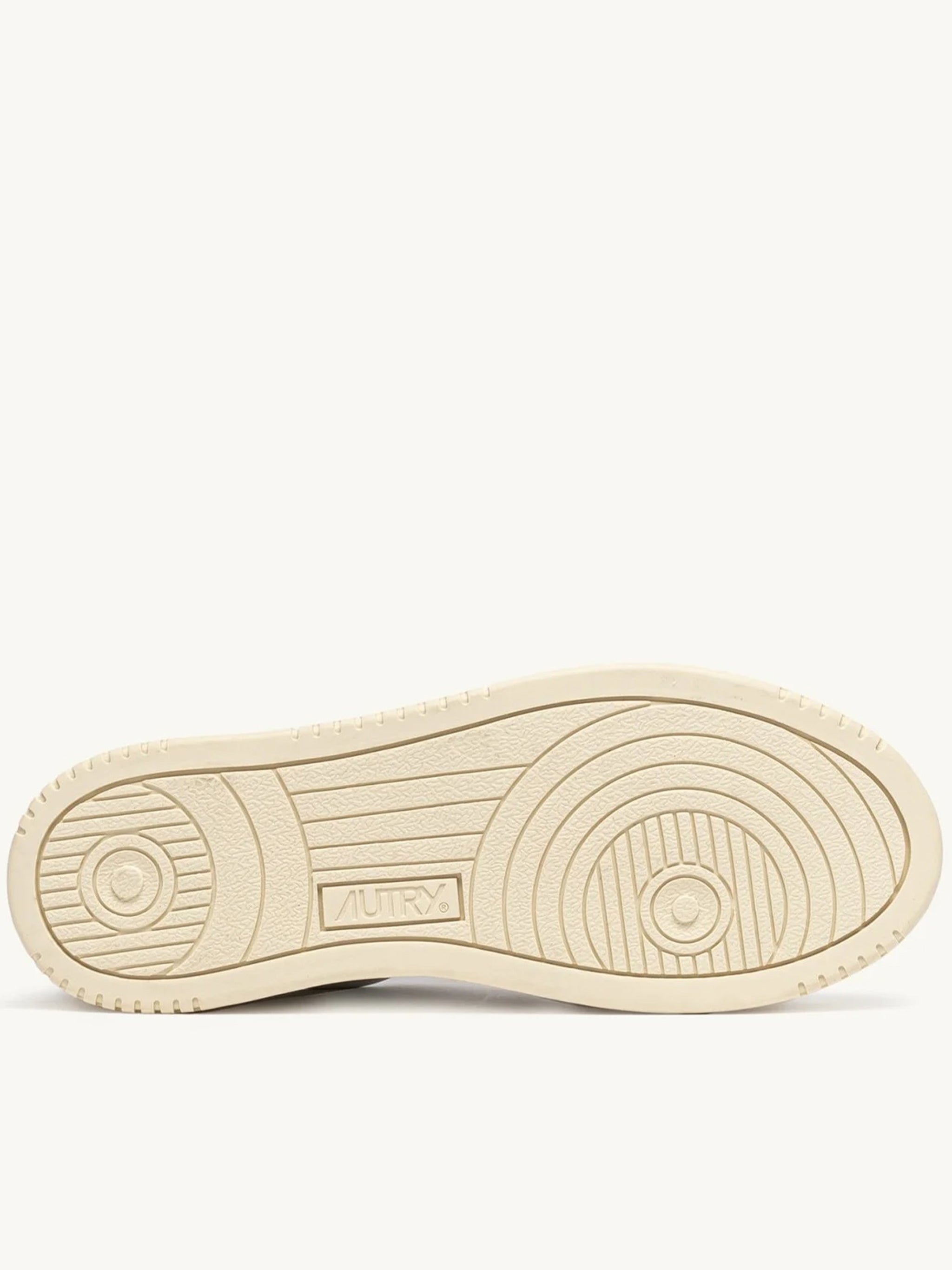Low-Top Sneakers With Perforated Detailing And Vintage Aesthetic