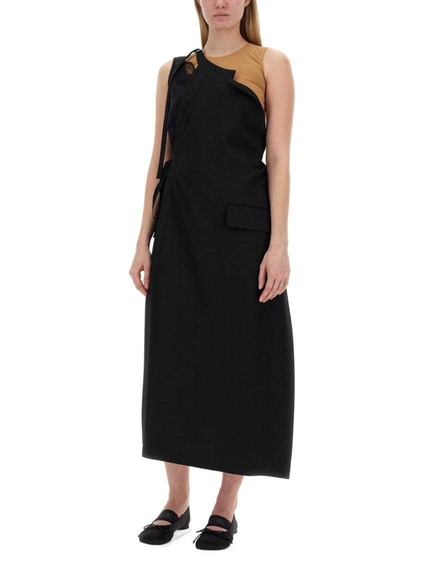 Asymmetrical Top With Fitted Bodice And Flowing Skirt