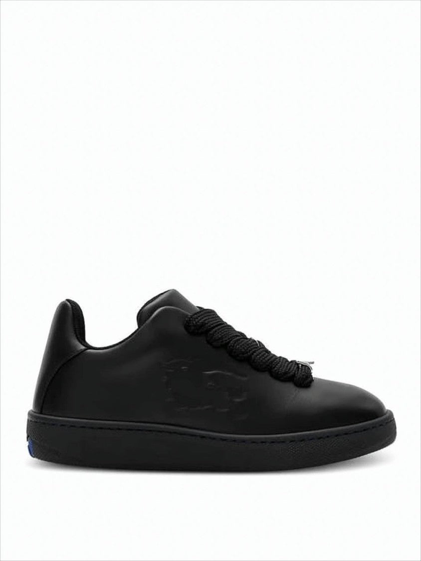 Monochromatic Black Leather Sneakers
