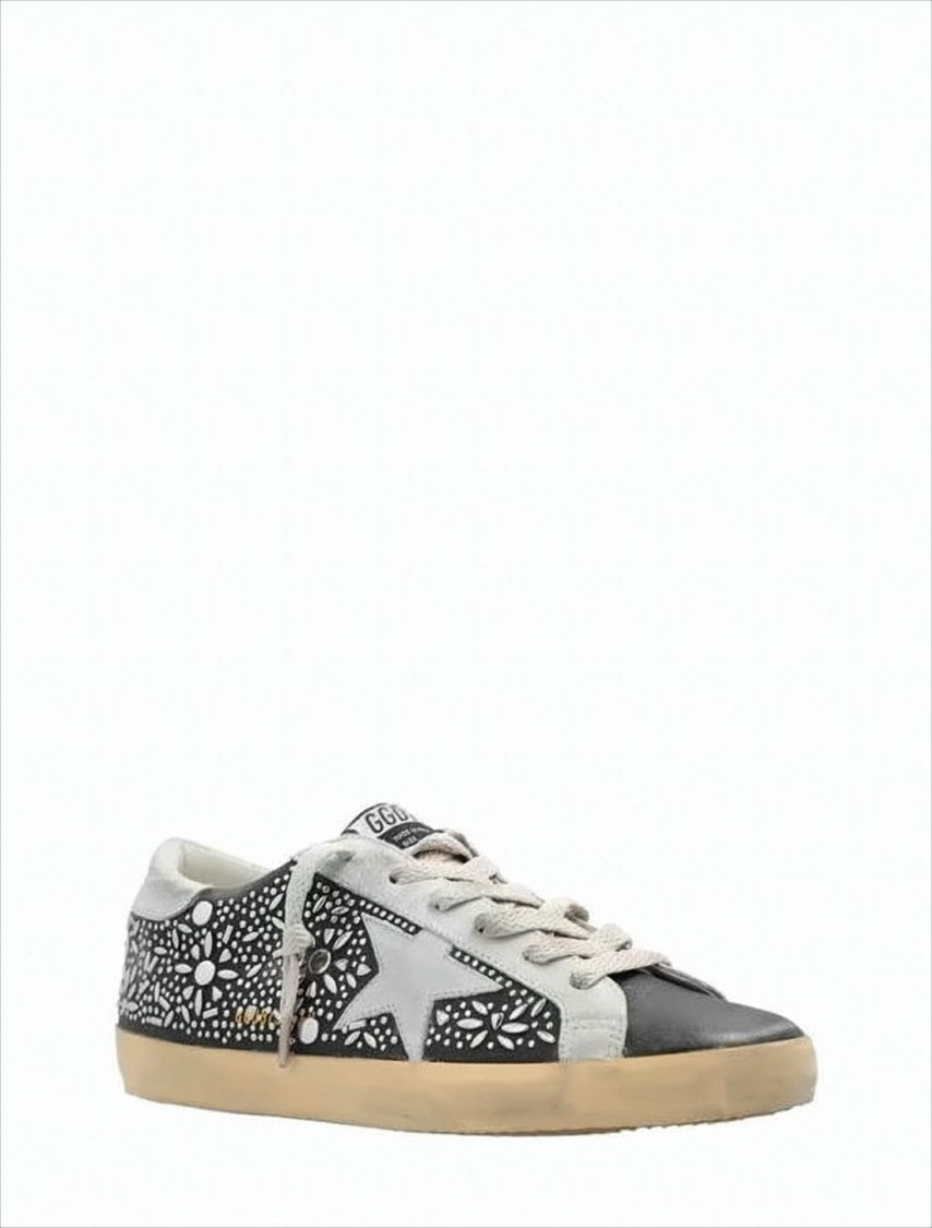 Black Leather Low-Top Sneakers with Floral Cut-Out Design