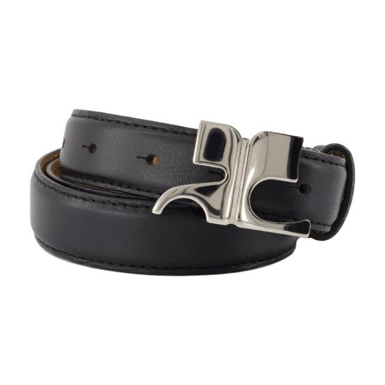 Smooth-Finish Black Leather Belt with Distinctive Metallic Buckle
