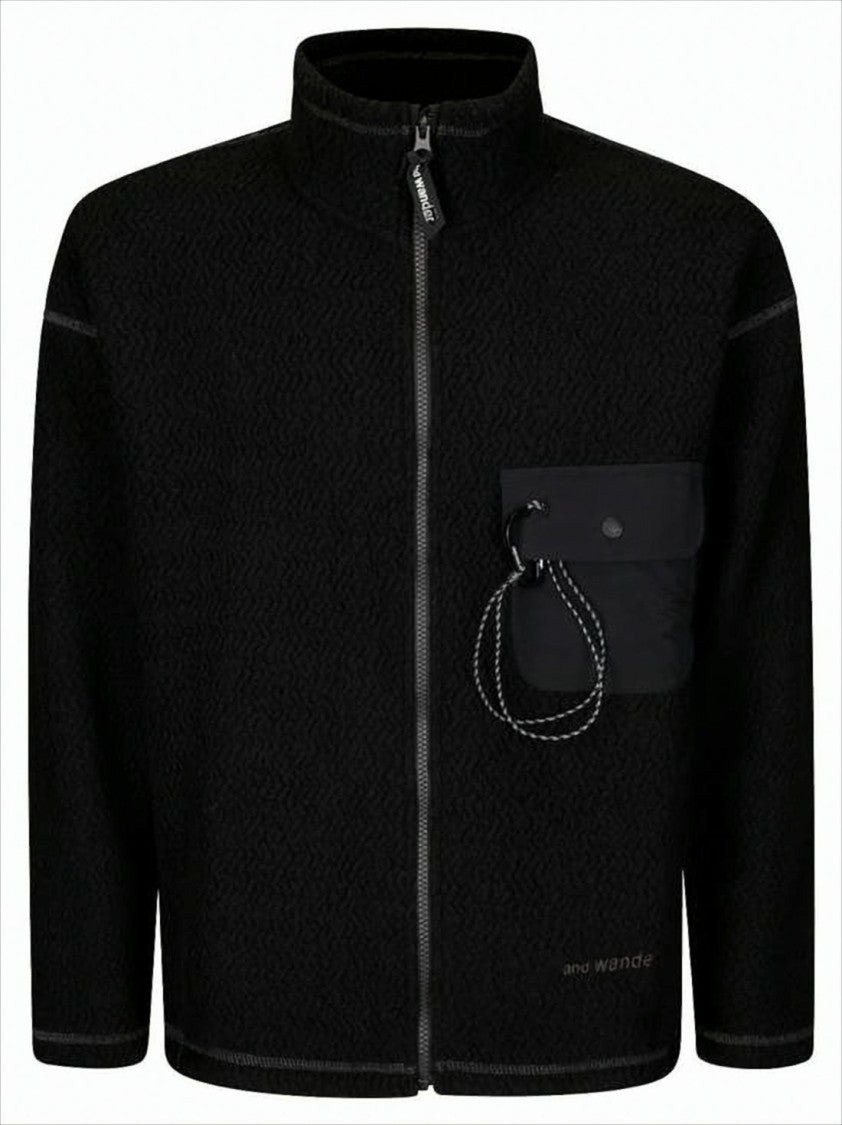 Textured Black Jacket With High Collar And Unique Pocket Design