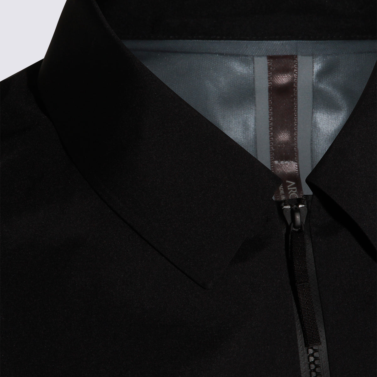 Minimalist Black Jacket with High Collar