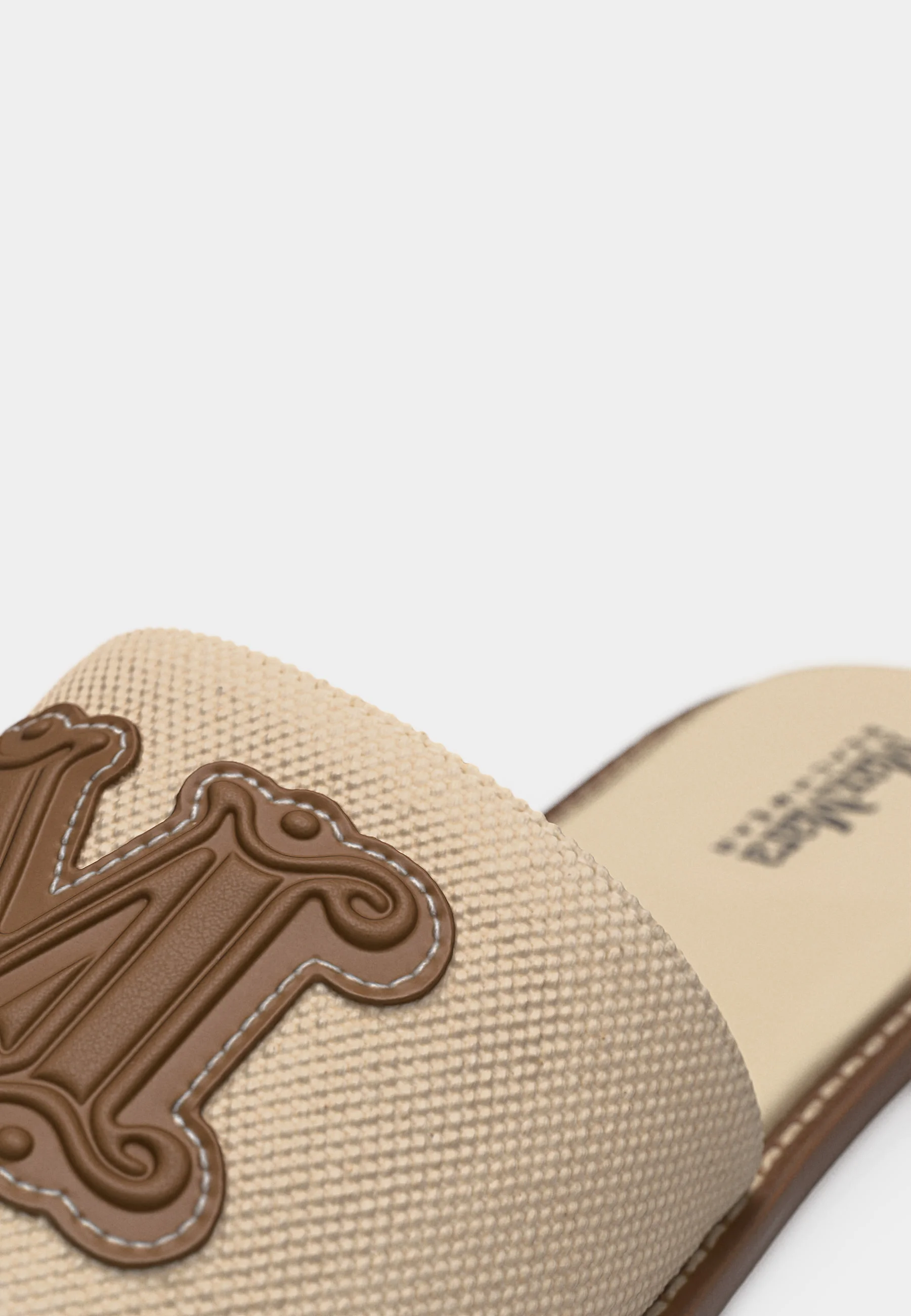 Beige Textured Slide Sandals with Embroidered Emblem
