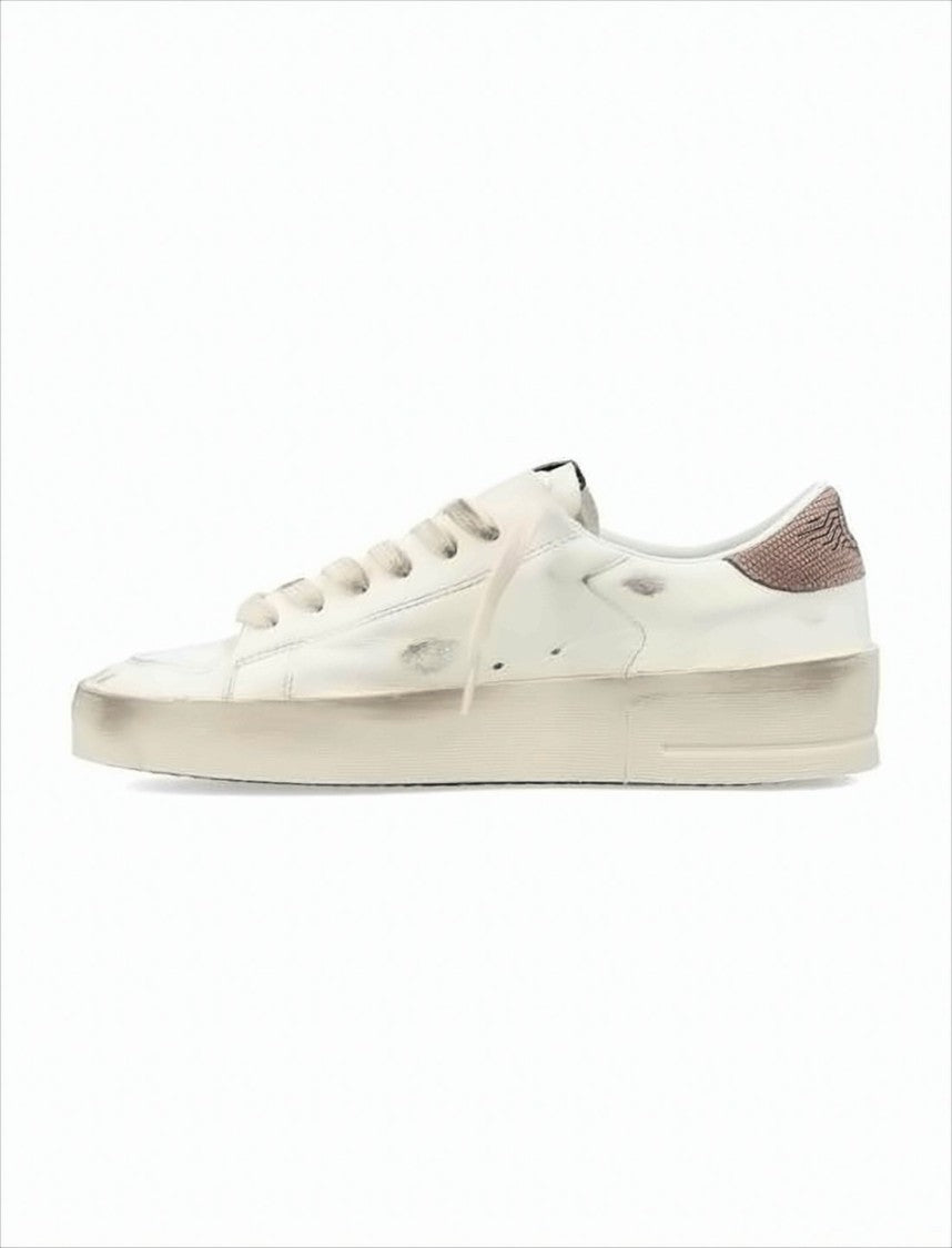 Distressed White Leather Low-Top Sneakers with Textured Star