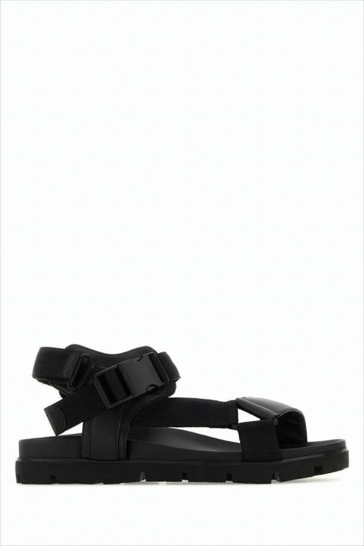 Minimalist Black Sandals with Adjustable Straps and Secure Buckle