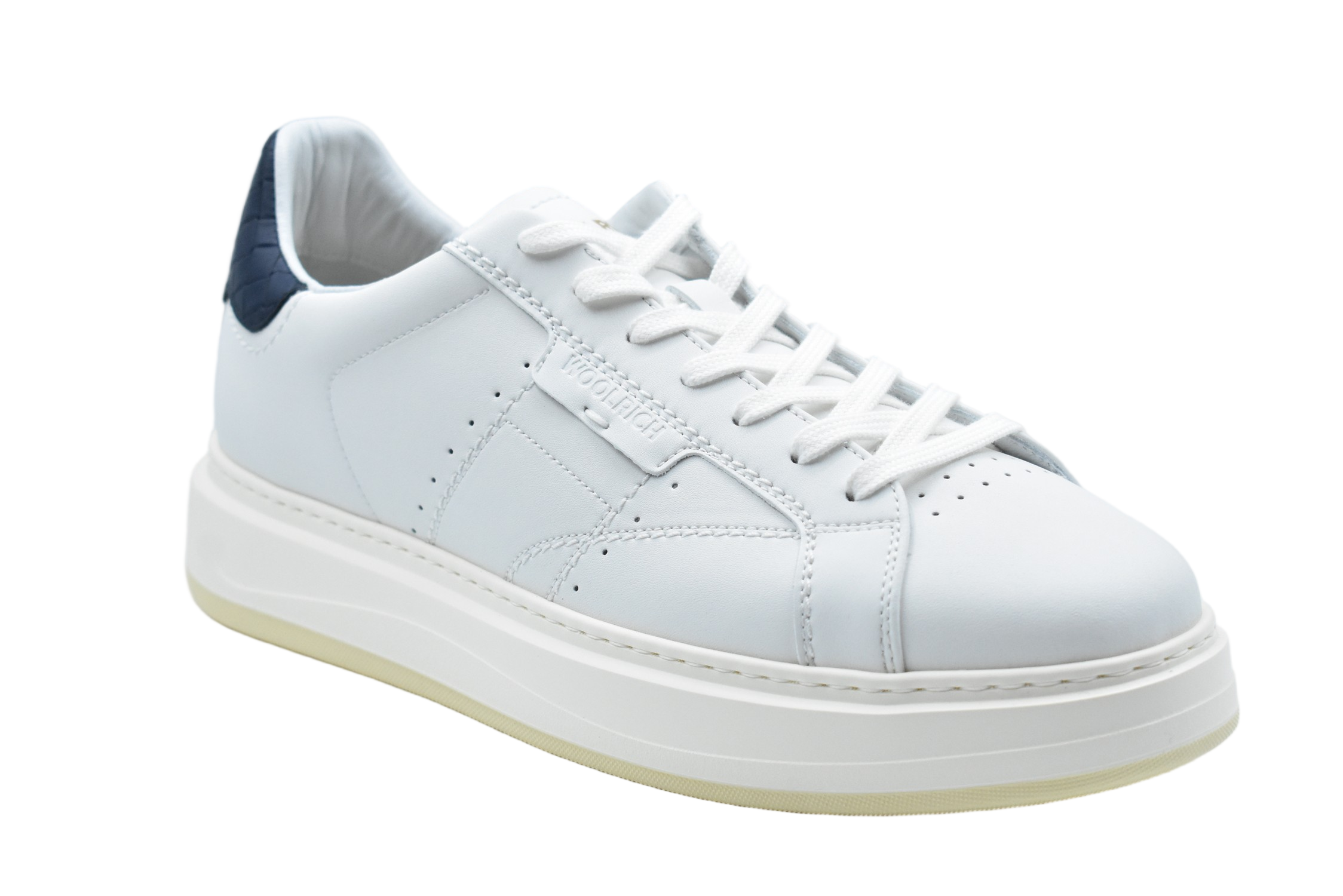 Low-Top Sneakers With Textured Accents And Elevated Sole