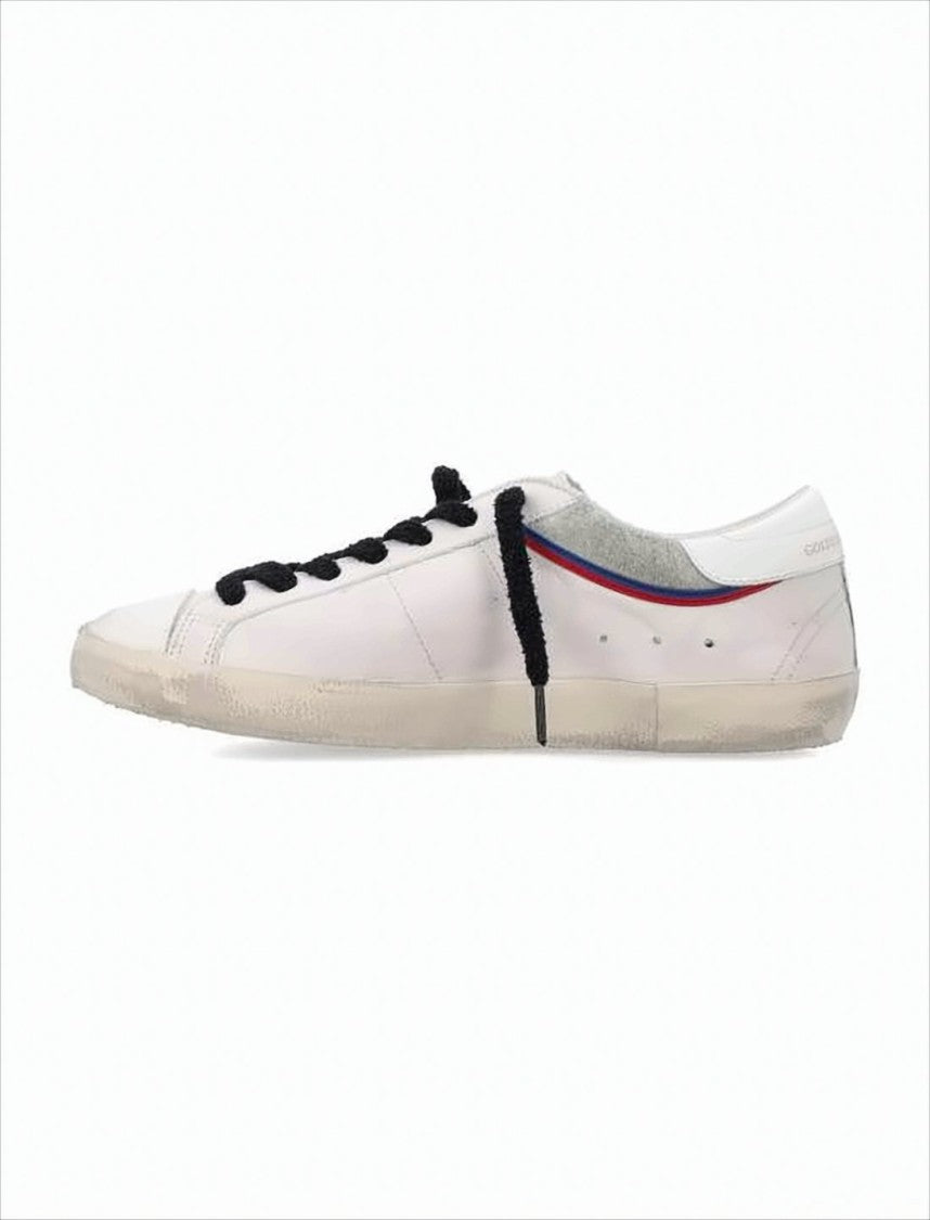 Distressed White Leather Low-Top Sneakers With Signature Star Detail