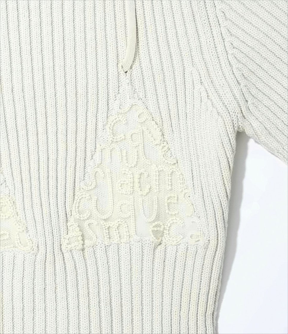 Ribbed Knit Sweater with Triangular Cut-Outs