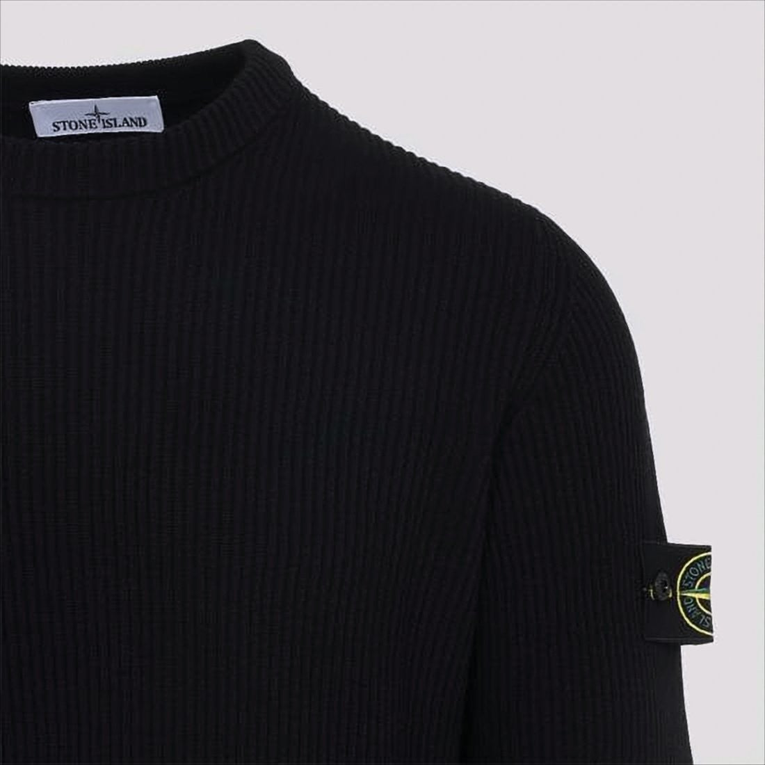 Ribbed Knit Black Sweater with Distinctive Sleeve Patch