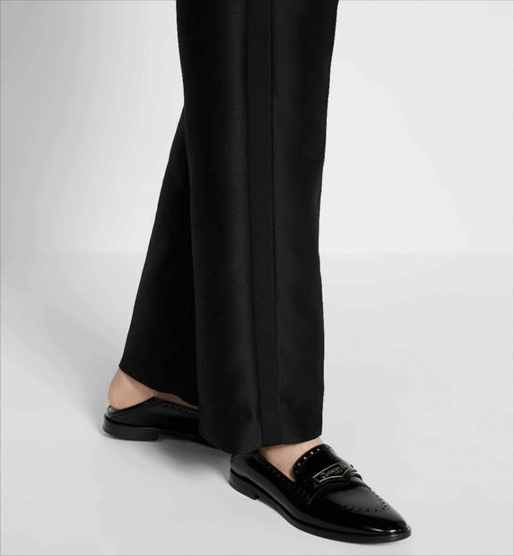 Sleek Backless Loafers with Perforated Detailing and Branded Plaque