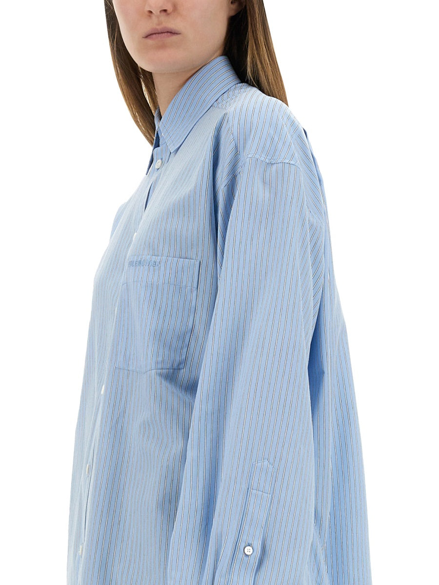 Blouse with Unique Knotted Cuffs and Refined Silhouette