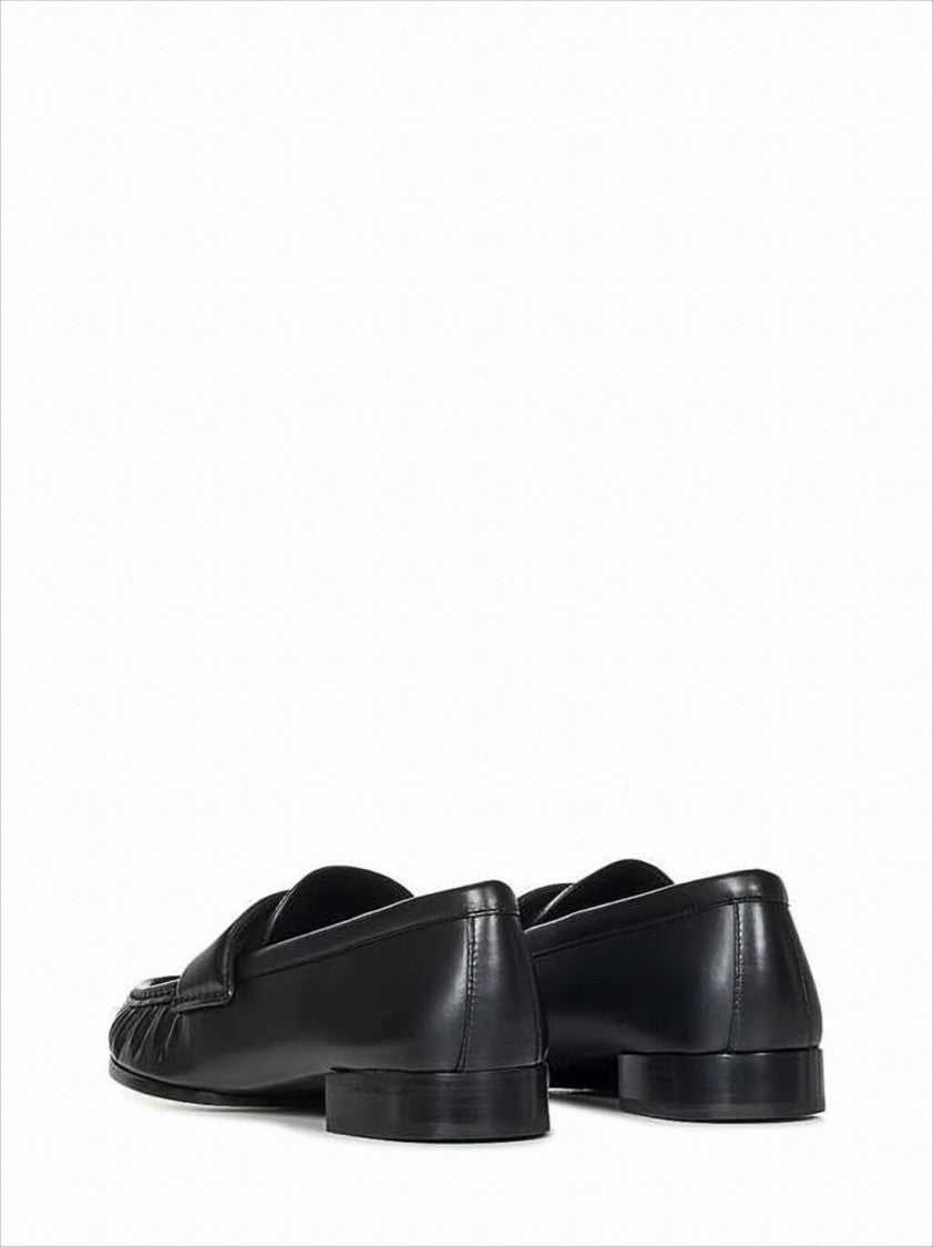 Black Lambskin Loafers with Moccasin Toe and Gold Emblem
