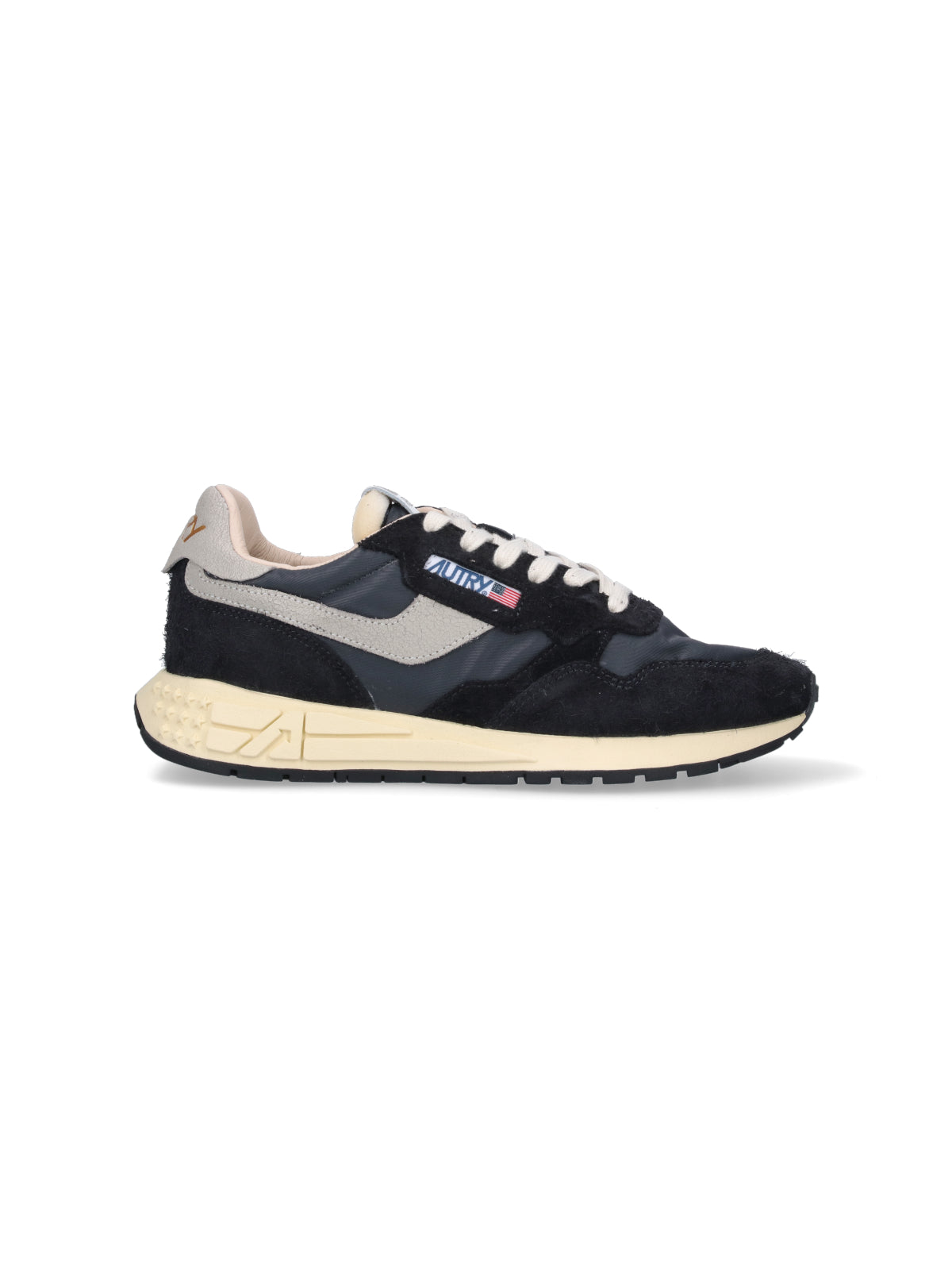 Streamlined Black Sneakers With Minimalist Design